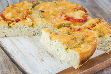 Cut bell pepper cheese focaccia bread.