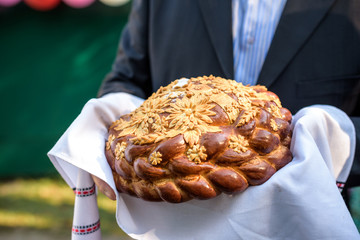 Traditional wedding Ukrainian bread Korovai with flowers