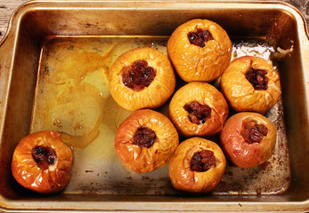 Hot baked apples stuffed with raisins and honey