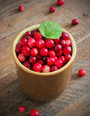 cranberries in a ceramic mug
