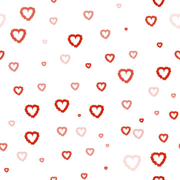 Seamless pattern with red hearts