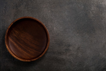 Glass bowl on slate rock.