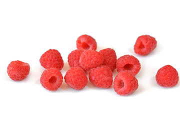 Raspberries close up on white background - isolated