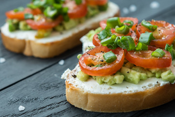 Ready to eat bruschetta with cream cheese, avocado tomatoes