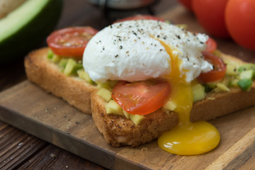 Ready to eat toast with poached egg and veggies