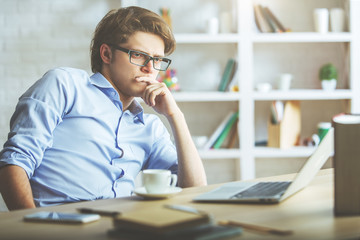 Businessman at workplace side