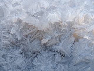 Winter patterns on glass from ice