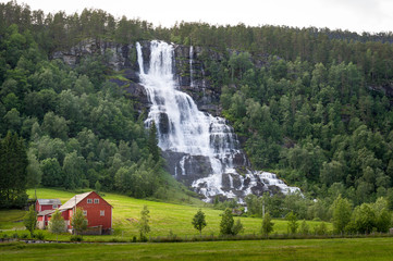 Tvindefossen waterfall in Norway village