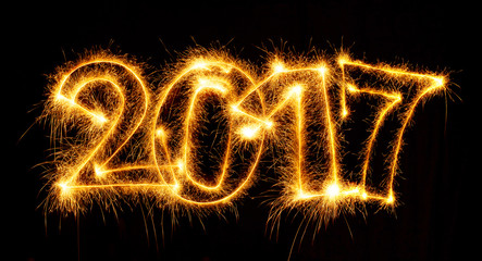 2017 with sparklers on black background