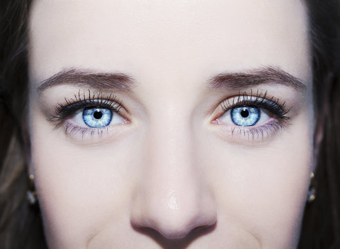 Beautiful insightful look blue woman's eyes.