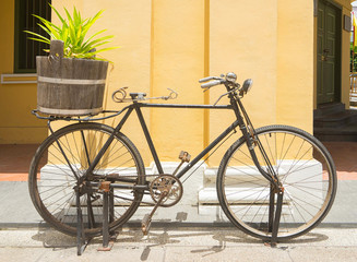 Fototapeta na wymiar Vintage bicycle on the street of old town.