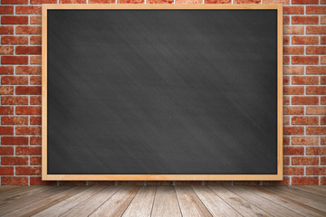 Chalkboard on red brick wall texture and wooden floor.