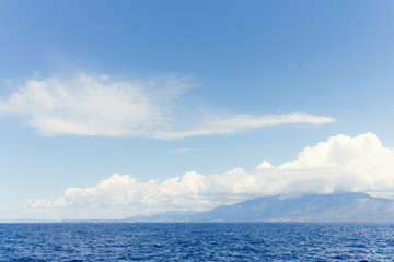 blue sea and clouds on sky