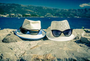 men's and women's beach hat and sunglasses 