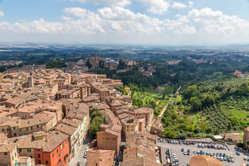Fototapeta na wymiar Siena, Italy. View from the tower of the historic center (UNESCO)
