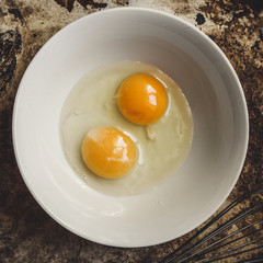 raw eggs in a bowl
