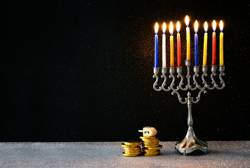 Image of jewish Hanukkah with wooden dreidel