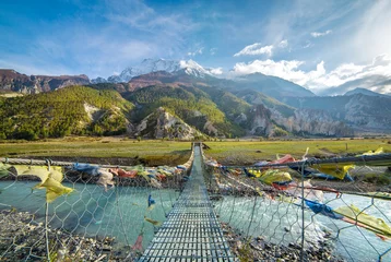 Küchenrückwand glas motiv Annapurna Hängebrücke mit buddhistischen Gebetsfahnen