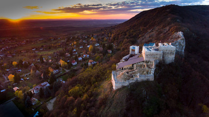 Aerial photo.  the panorama of fortress ruins is a Hungarian in sunset. © janossygergely
