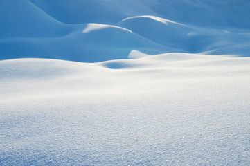 Winter bright background of pure brilliant snow.