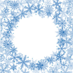 Abstract Christmas background with blue snowflakes.