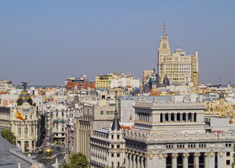 Fototapeta na wymiar Spain, Madrid, View from the Cybele Palace towards the Alcala Street and the Metropolis Building.