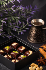 Luxury handmade chocolate candies with nuts in gift box