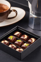Luxury handmade chocolate candies with nuts in gift box