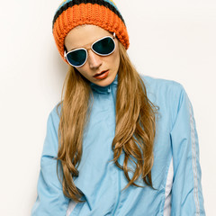  Brunette Beanie hat and stylish sunglasses. Warm autumn winter