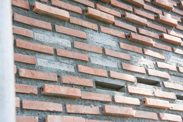 void on red old brick wall background 