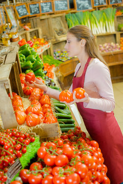 woman selling vegetables