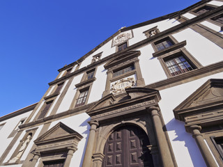 Fototapeta na wymiar Portugal, Madeira, Funchal, Jesuit College and Church on Praca do Municipio, part of the Madeira and the Catholic Universities..