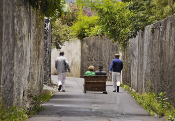 Portugal, Madeira, Funchal, Carreiros do Monte, Wicker Toboggan Sled Ride from Monte to Funchal..