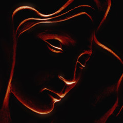 silhouette of Virgin Mary on black background