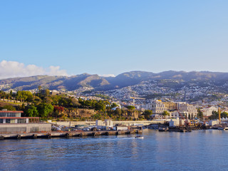 Portugal, Madeira, Funchal, Cityscape viewed from the ferry leaving the port..