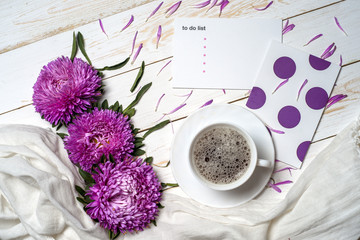 Word relax with cup of coffee and pink flowers