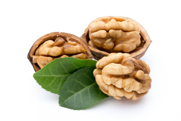 Walnut and walnut kernel isolated on the white background.