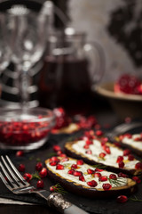 Grilled eggplants with garlic yogurt sauce, dill and pomegranate
