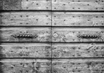 Details of an ancient Italian door in Florence, Italy (Black and White).