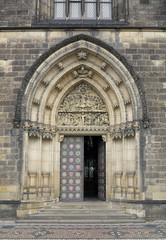 Entrance portal of the church on Vysehrad in Prague with sculptu
