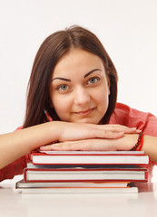  Portrait of a beautiful student with books