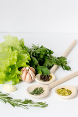 fresh salad with garlic and spices on white background