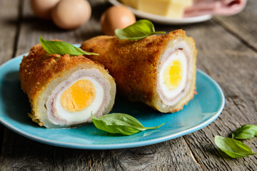 Fried pepper stuffed with pork cutlet, ham, cheese and egg