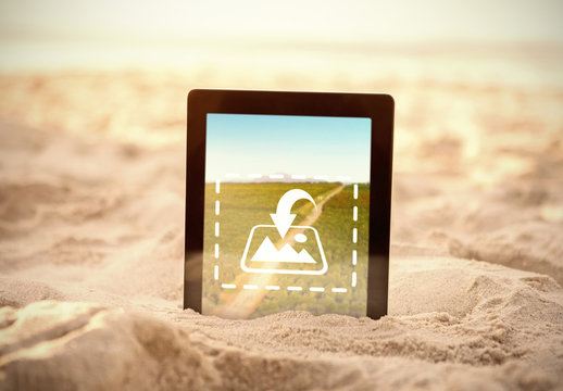 Tablet Stuck in the Sand Mockup