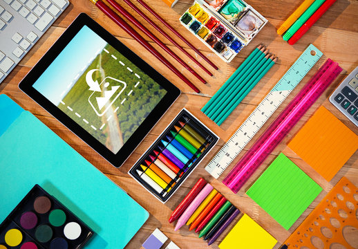 Tablet Surrounded by Organized Art Supplies Mockup