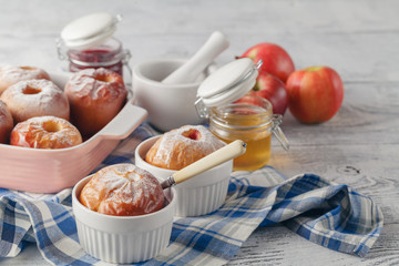 baked apples with cinnamon and walnuts, cup of tea, autumn desse