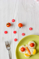 kid breakfast butterfly sandwiches top view on wooden background