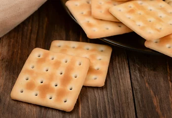 Foto auf Leinwand Saltine crispy crackers © Coprid