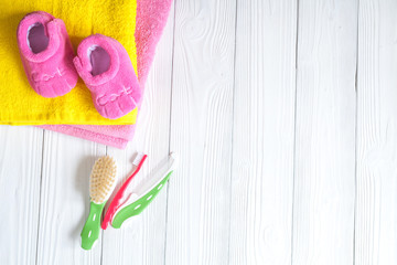 baby accessories for bath on wooden background