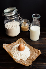 Home baking. Baking ingredients on the wooden table